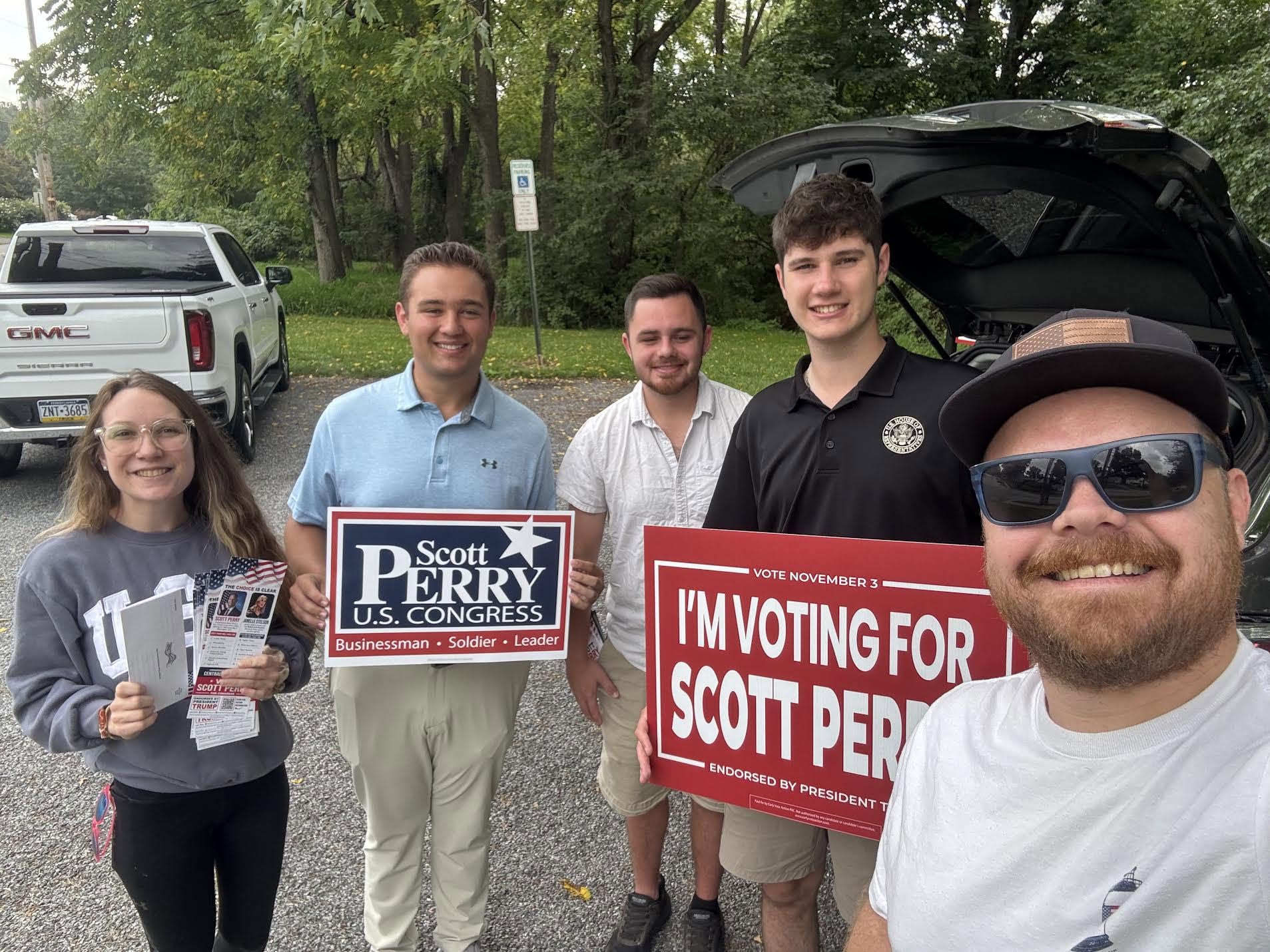 Freedom Caucus Fund supporters with campaign signs
